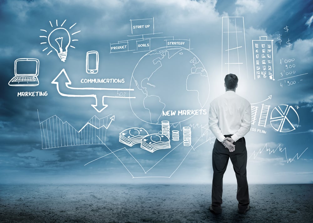Businessman considering a brainstorm for marketing in cloudy landscape Businessman considering a brainstorm for marketing in cloudy landscape